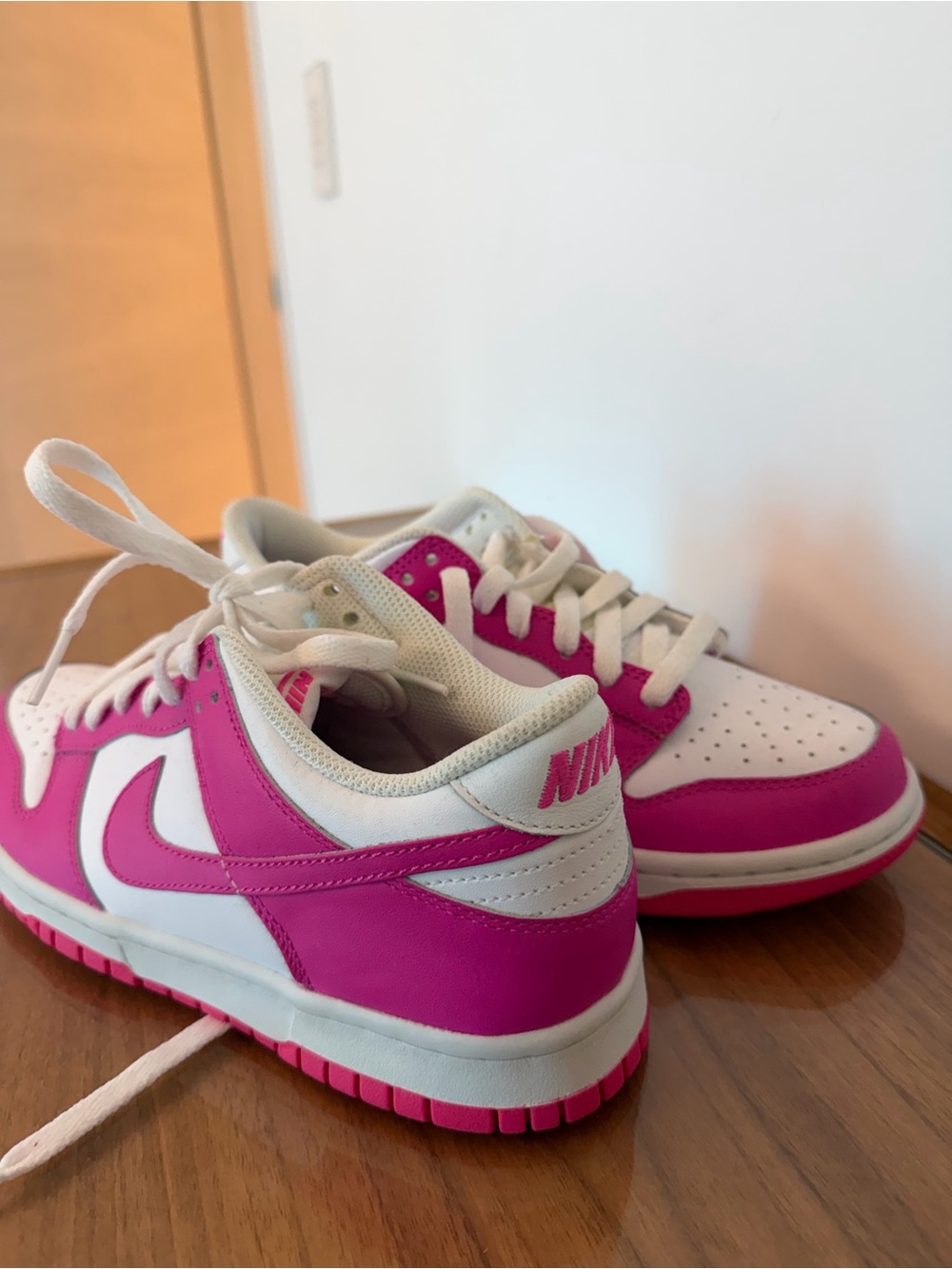 Nike Kids Pink and White Low-Top Sneakers — Bold Contrast